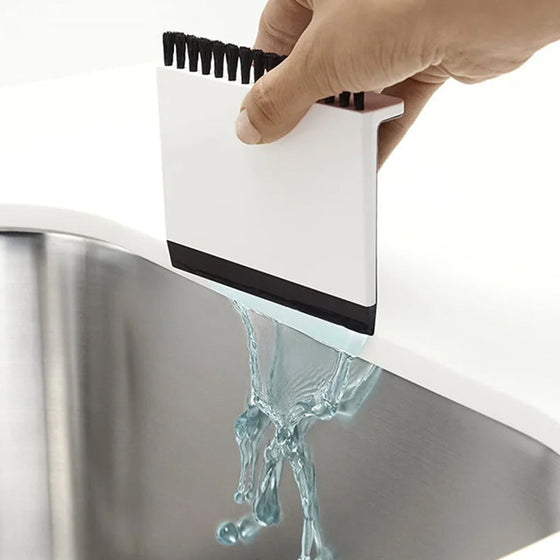 Abzieher für die Küchenspüle und Bürste für die Arbeitsplatte